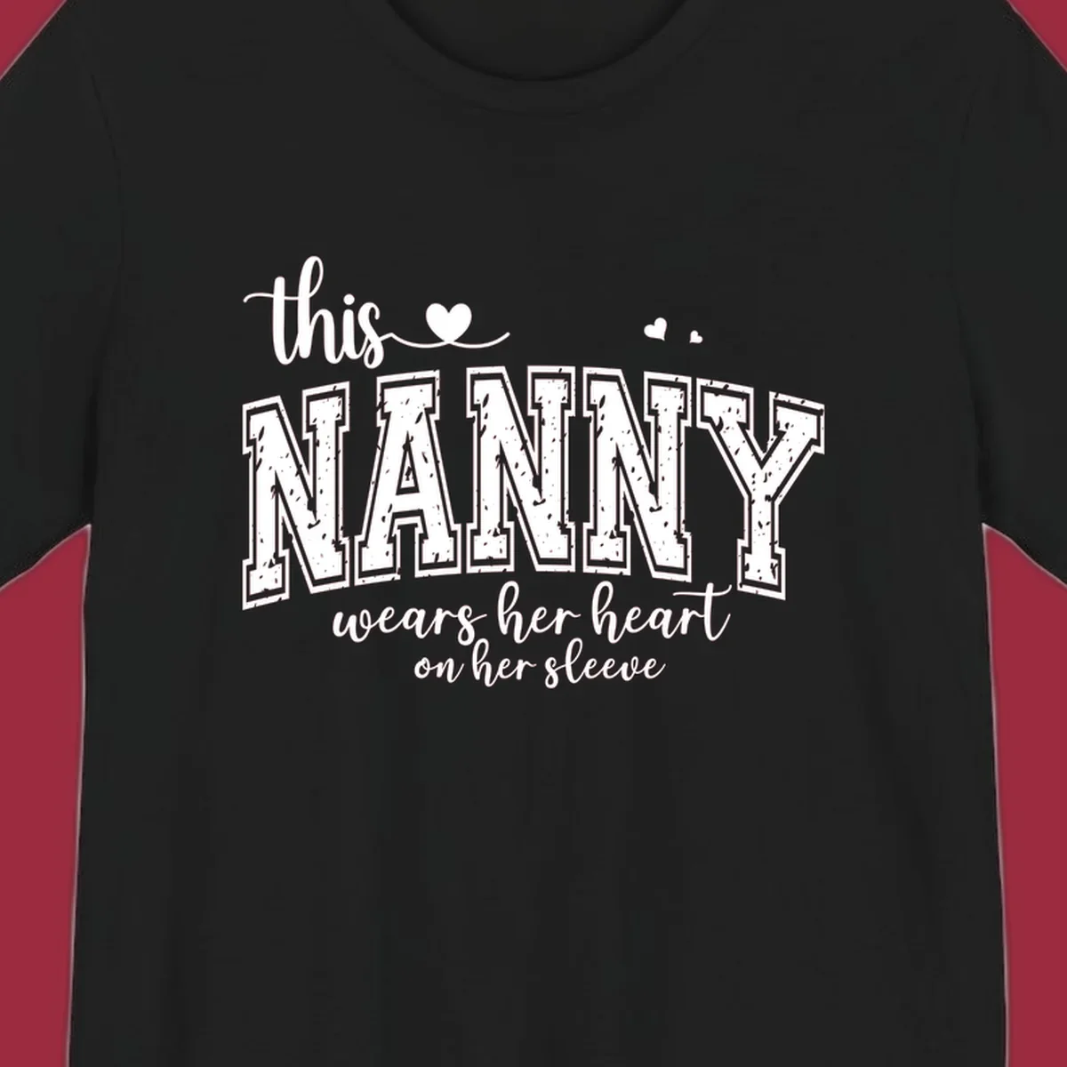 This Nanny Wears Her Heart On Her Sleeve typography design with hearts.