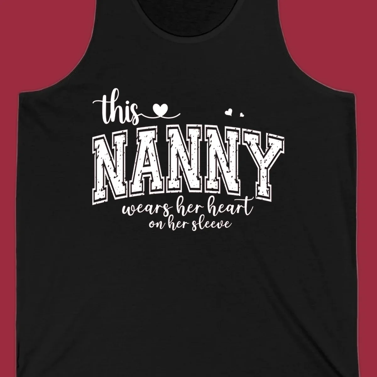 This Nanny Wears Her Heart On Her Sleeve typography design with hearts.