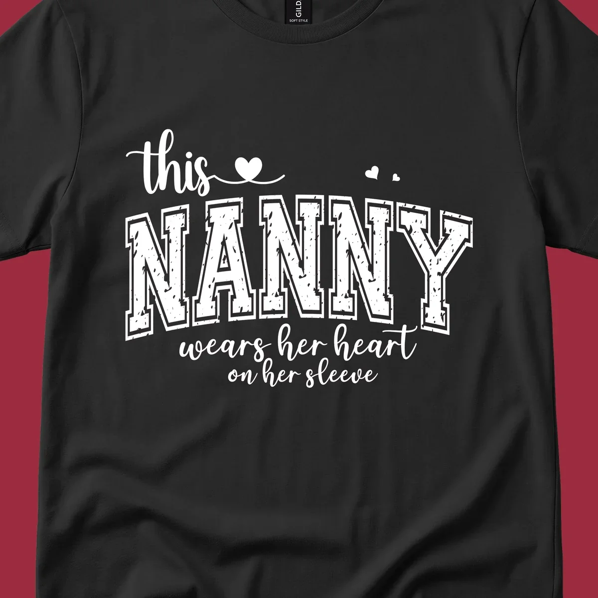 This Nanny Wears Her Heart On Her Sleeve typography design with hearts.