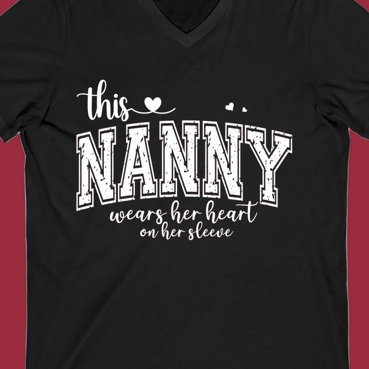 This Nanny Wears Her Heart On Her Sleeve typography design with hearts.