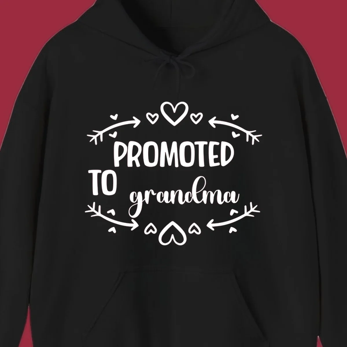 Promoted to Grandma text with hearts and arrows graphic.