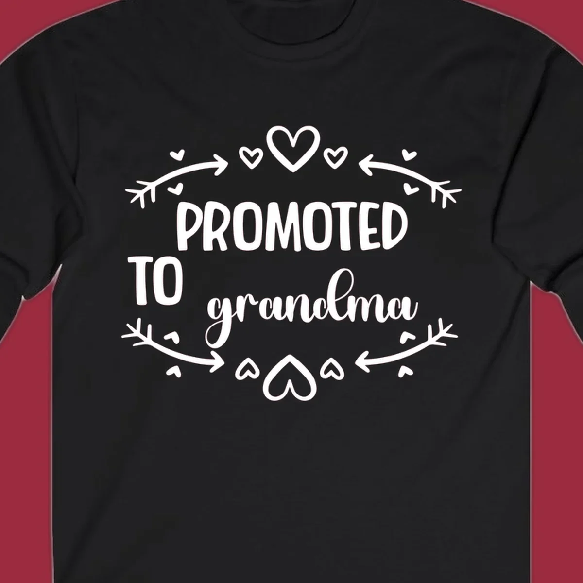Promoted to Grandma text with hearts and arrows graphic.