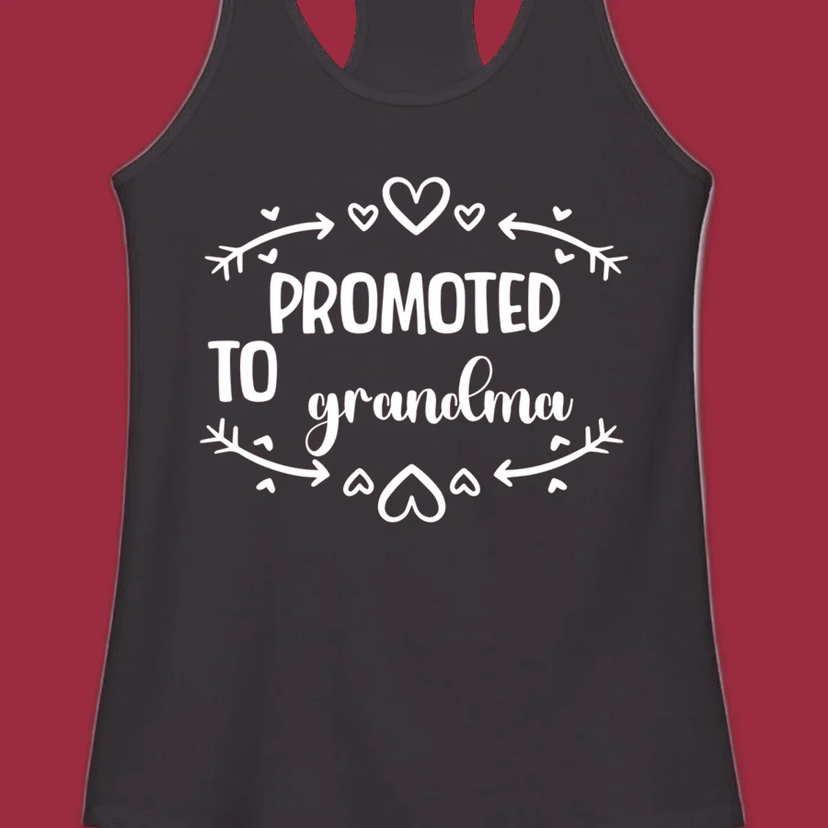 Promoted to Grandma text with hearts and arrows graphic.