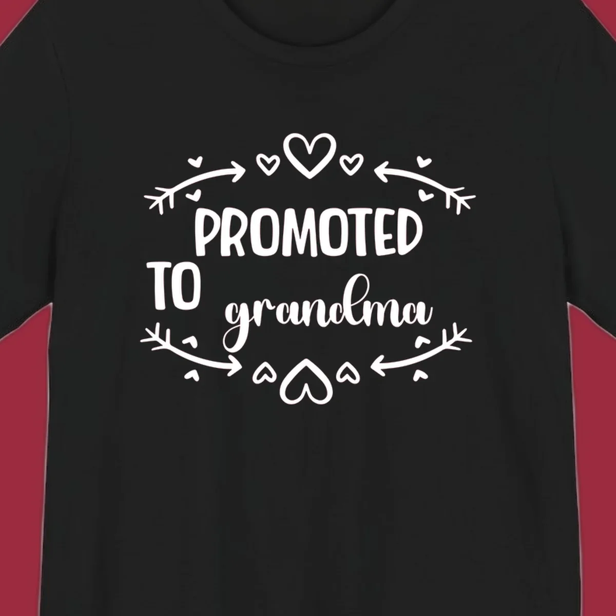 Promoted to Grandma text with hearts and arrows graphic.