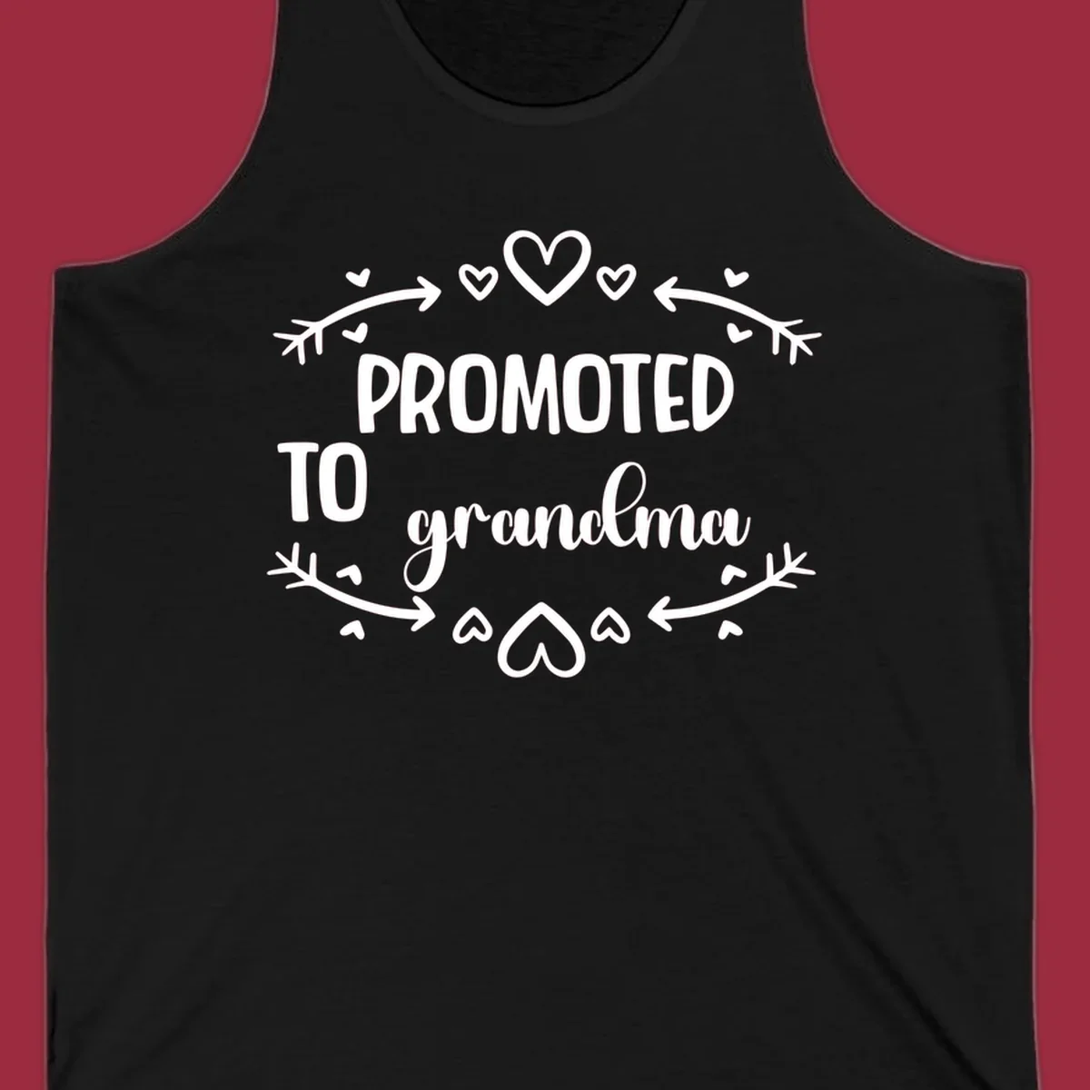 Promoted to Grandma text with hearts and arrows graphic.