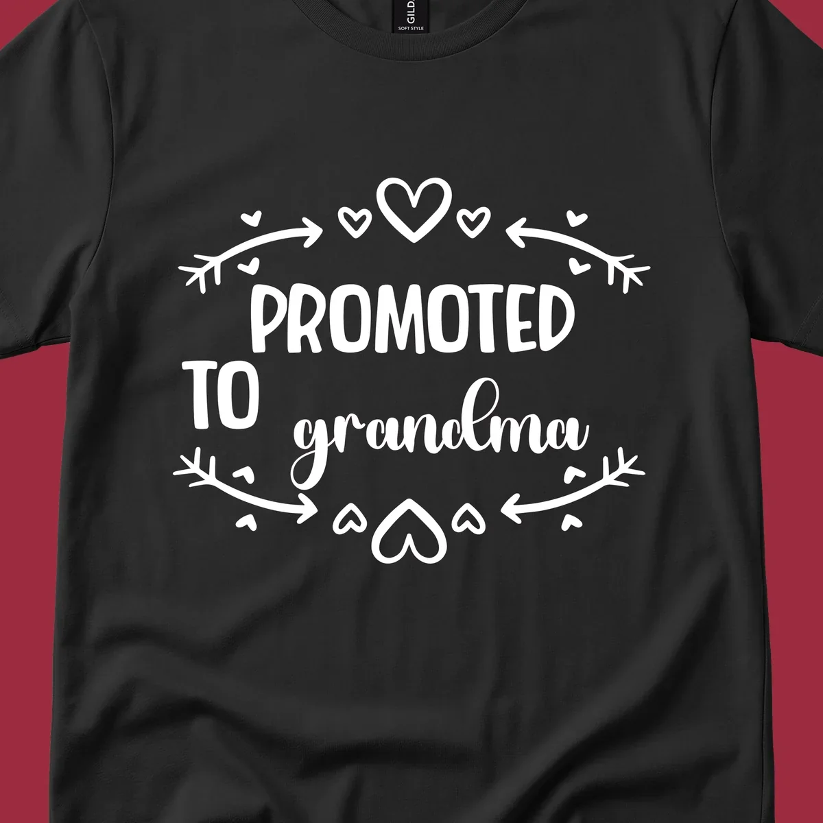 Promoted to Grandma text with hearts and arrows graphic.