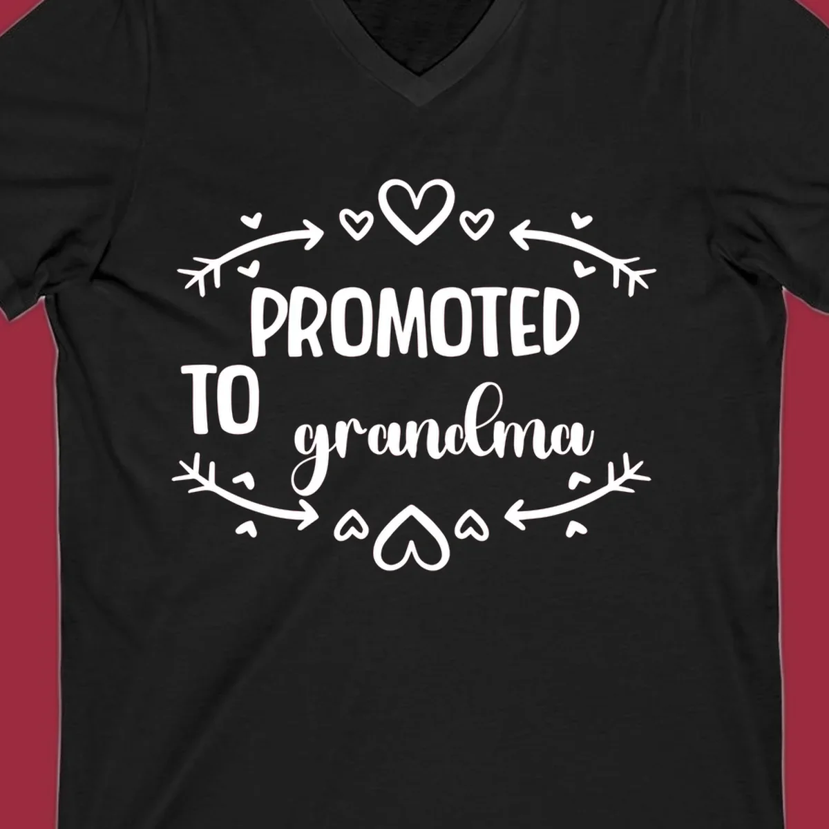 Promoted to Grandma text with hearts and arrows graphic.