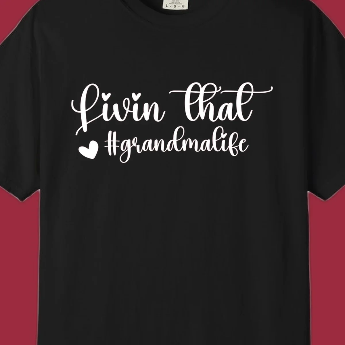 Livin that grandma life script with hearts, white on black and black on white.