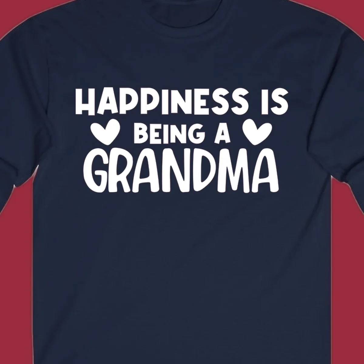 Happiness is being a grandma quote with heart graphics.