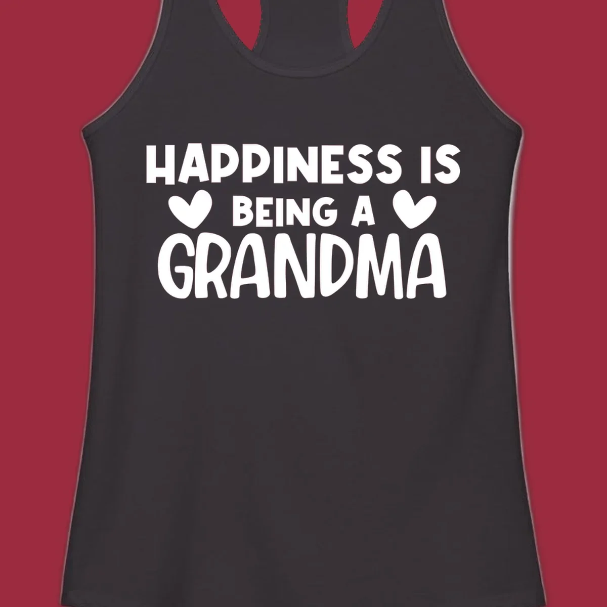 Happiness is being a grandma quote with heart graphics.