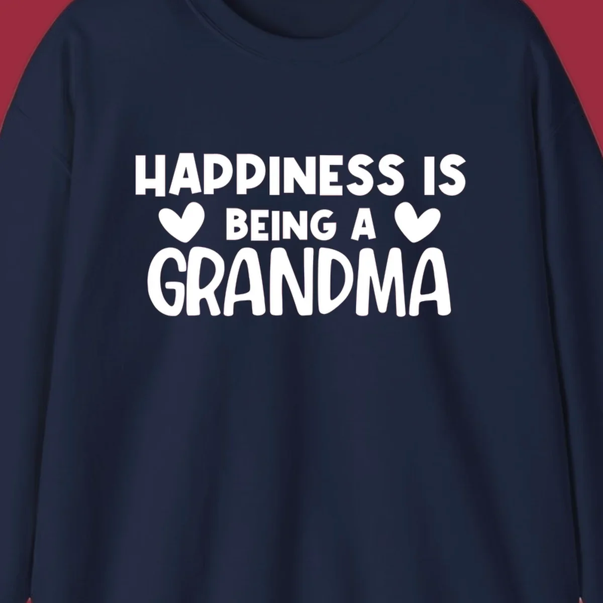 Happiness is being a grandma quote with heart graphics.
