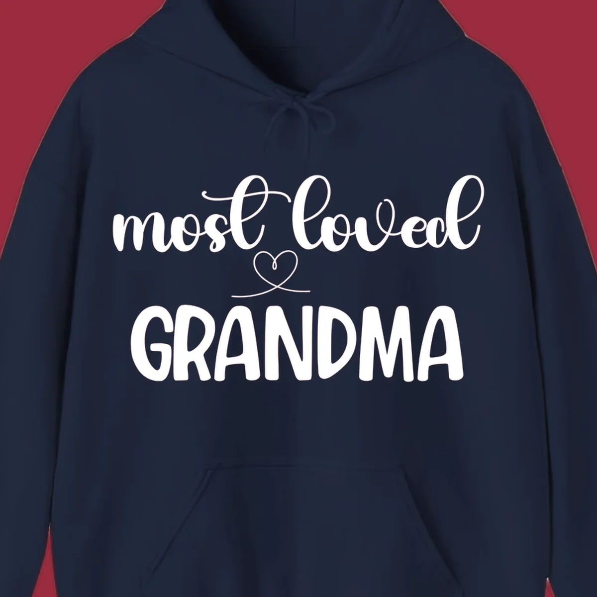 Most loved grandma typography design with a heart graphic.