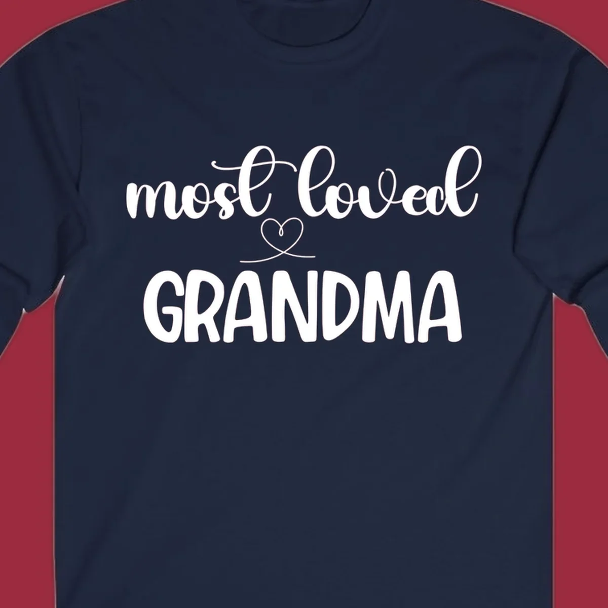 Most loved grandma typography design with a heart graphic.