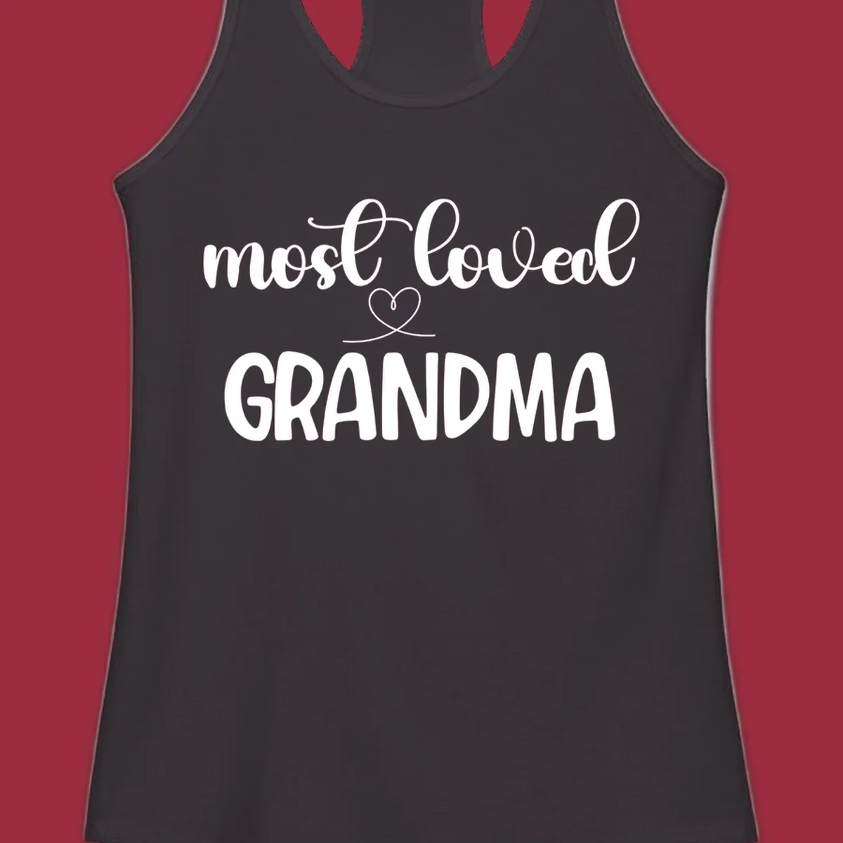 Most loved grandma typography design with a heart graphic.