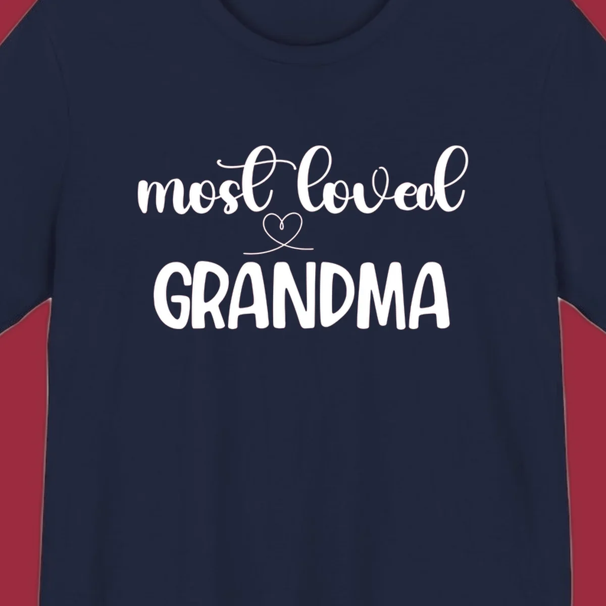 Most loved grandma typography design with a heart graphic.
