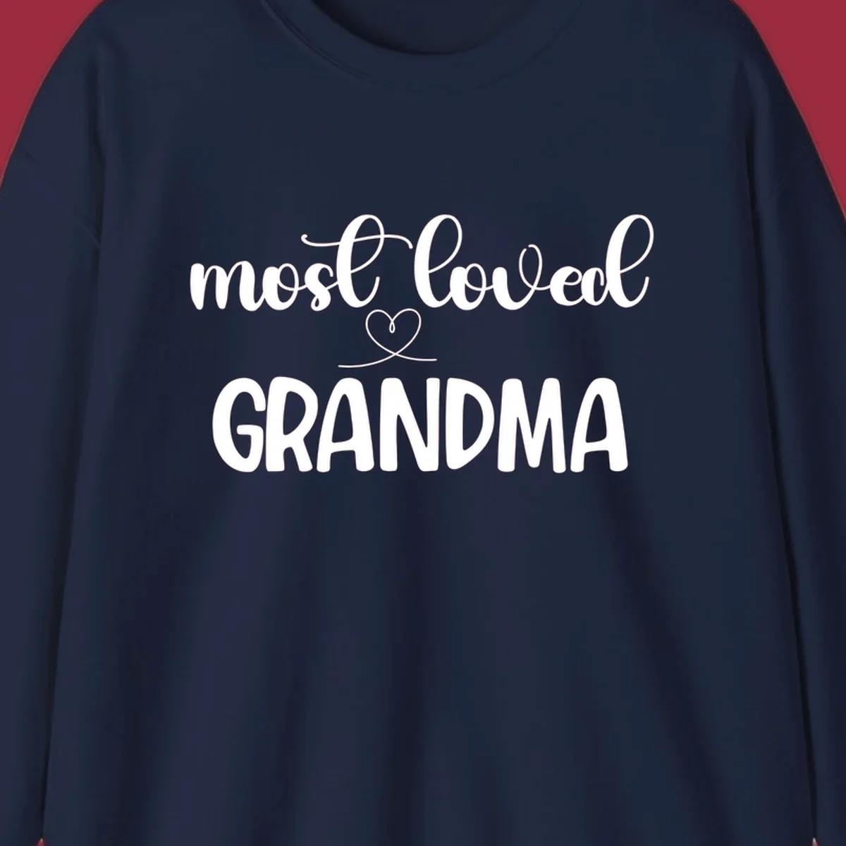 Most loved grandma typography design with a heart graphic.