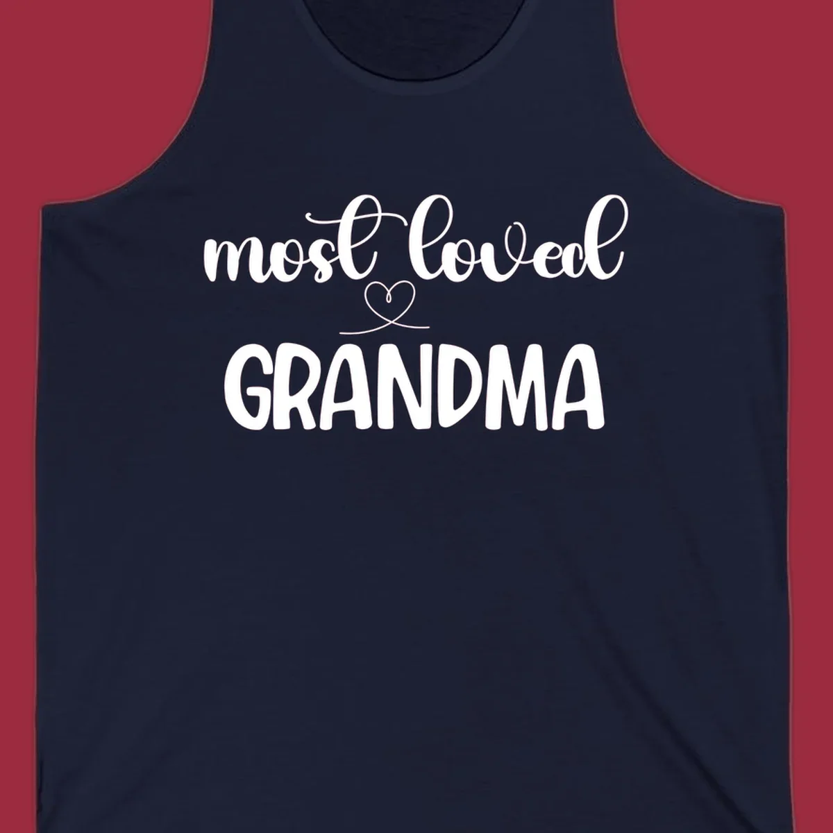 Most loved grandma typography design with a heart graphic.