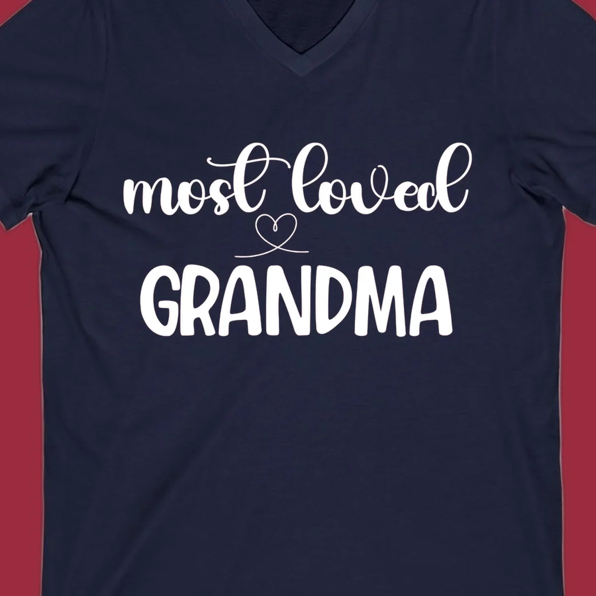 Most loved grandma typography design with a heart graphic.