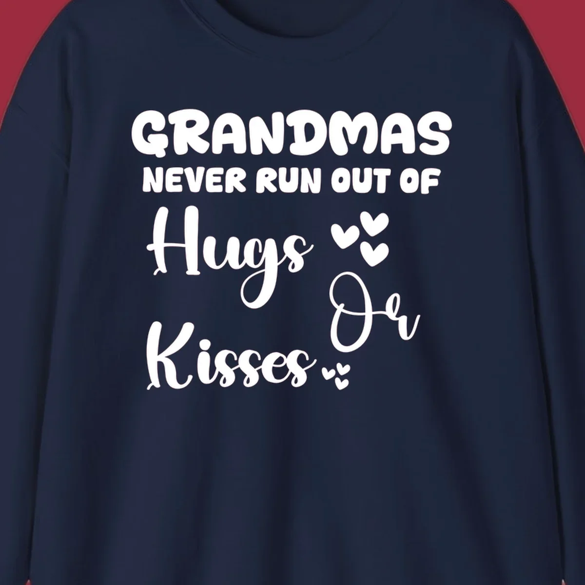 Grandma hugs and kisses typography design with heart accents.