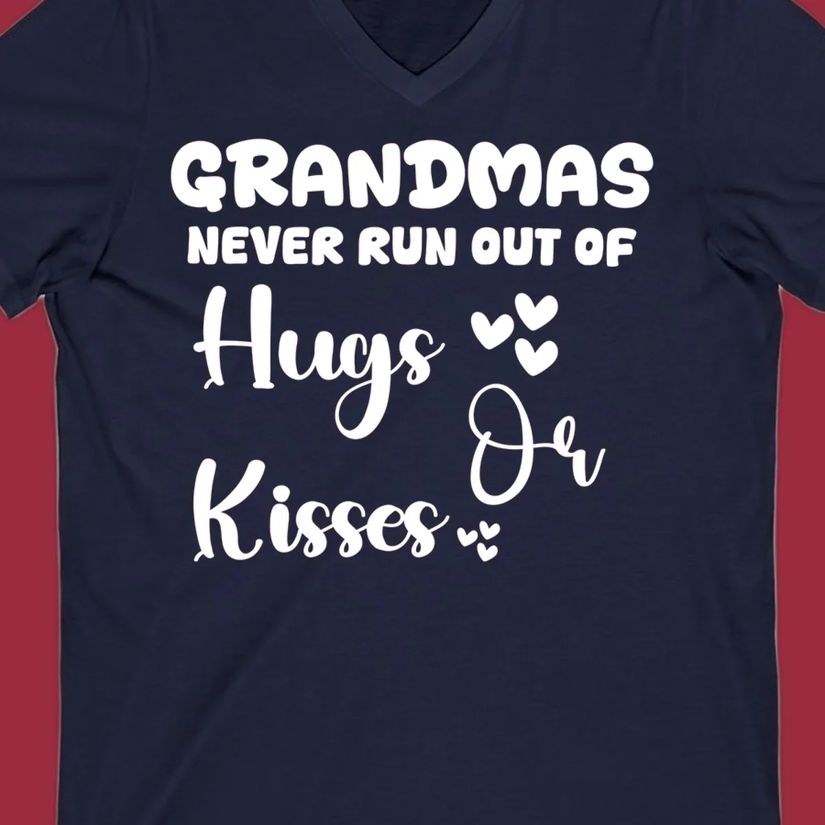 Grandma hugs and kisses typography design with heart accents.