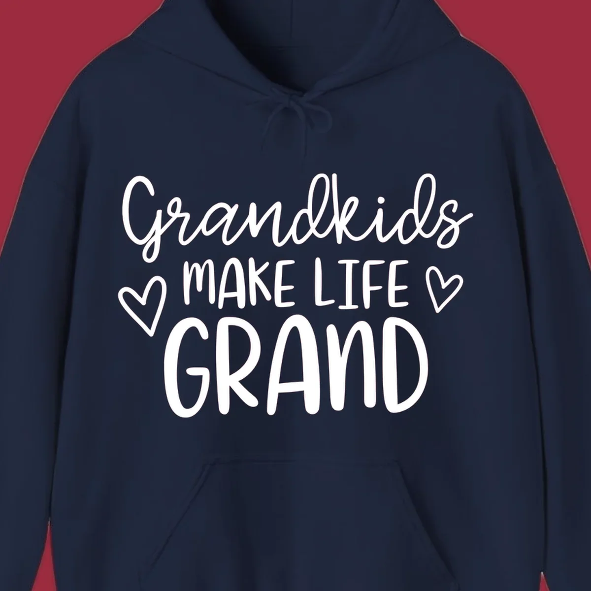 Grandkids Make Life Grand text with hearts, white on black and white.