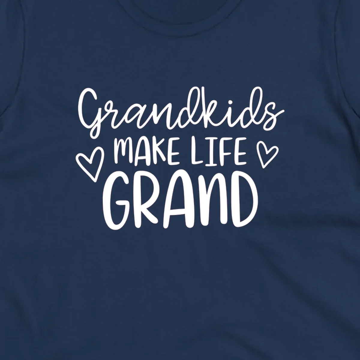 Grandkids Make Life Grand text with hearts, white on black and white.