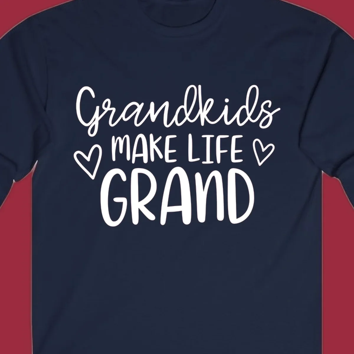 Grandkids Make Life Grand text with hearts, white on black and white.