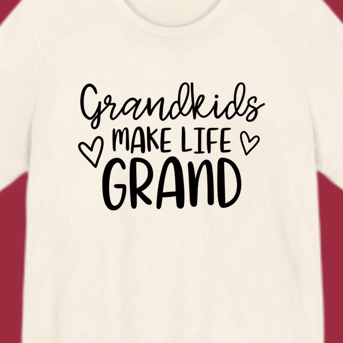 Grandkids Make Life Grand text with hearts, white on black and white.