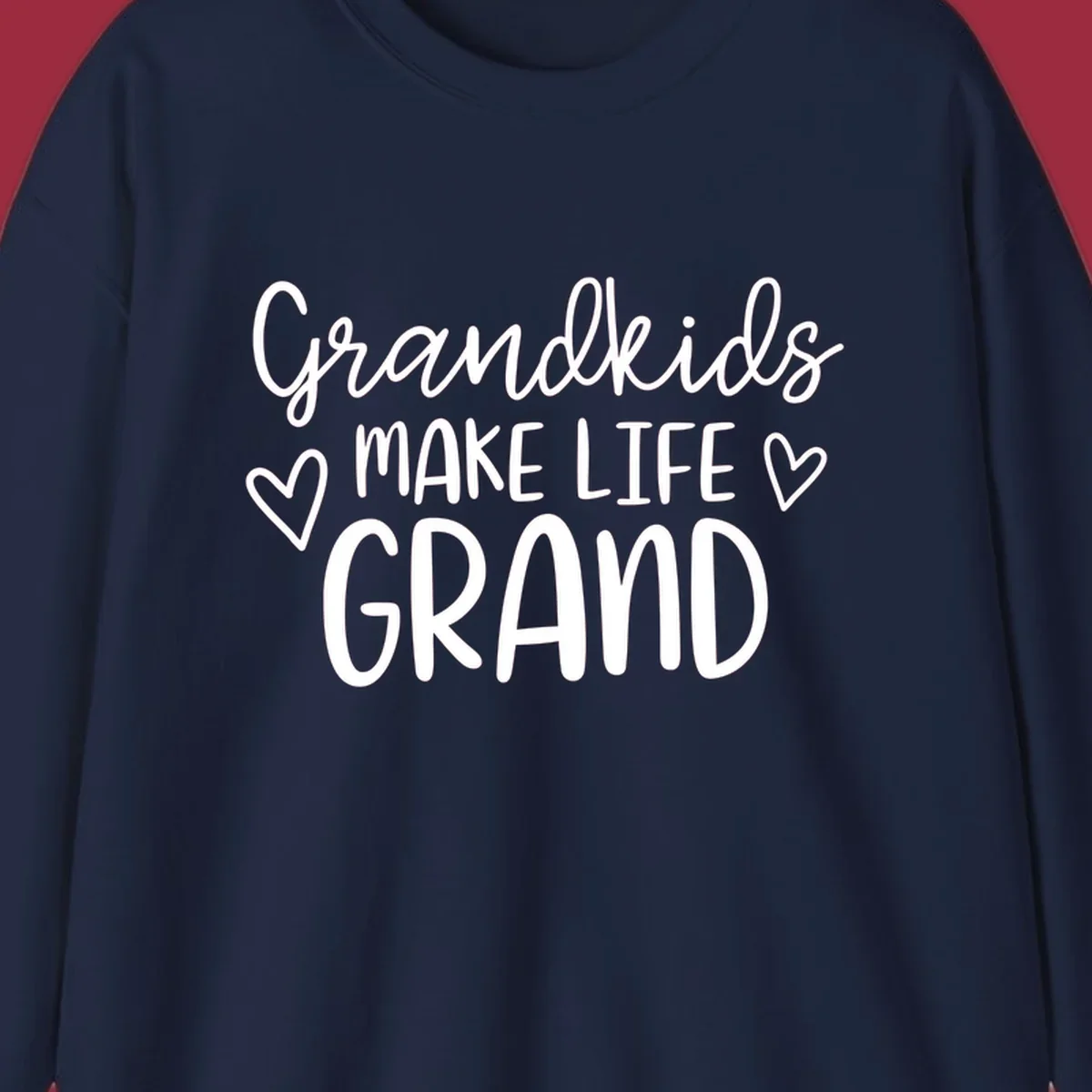 Grandkids Make Life Grand text with hearts, white on black and white.