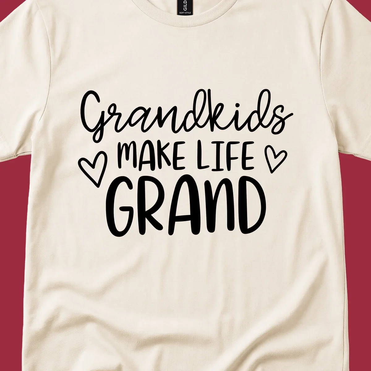 Grandkids Make Life Grand text with hearts, white on black and white.