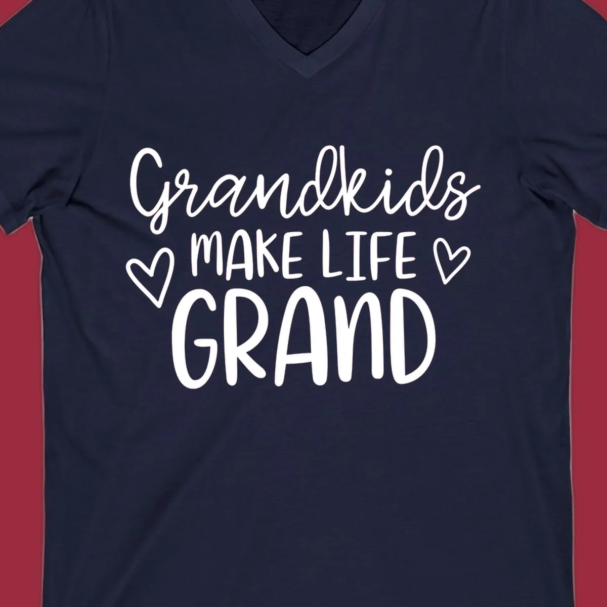 Grandkids Make Life Grand text with hearts, white on black and white.