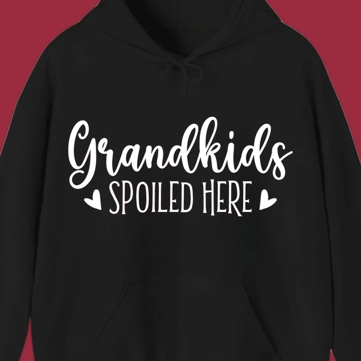 Grandkids Spoiled Here typography design with heart accents.