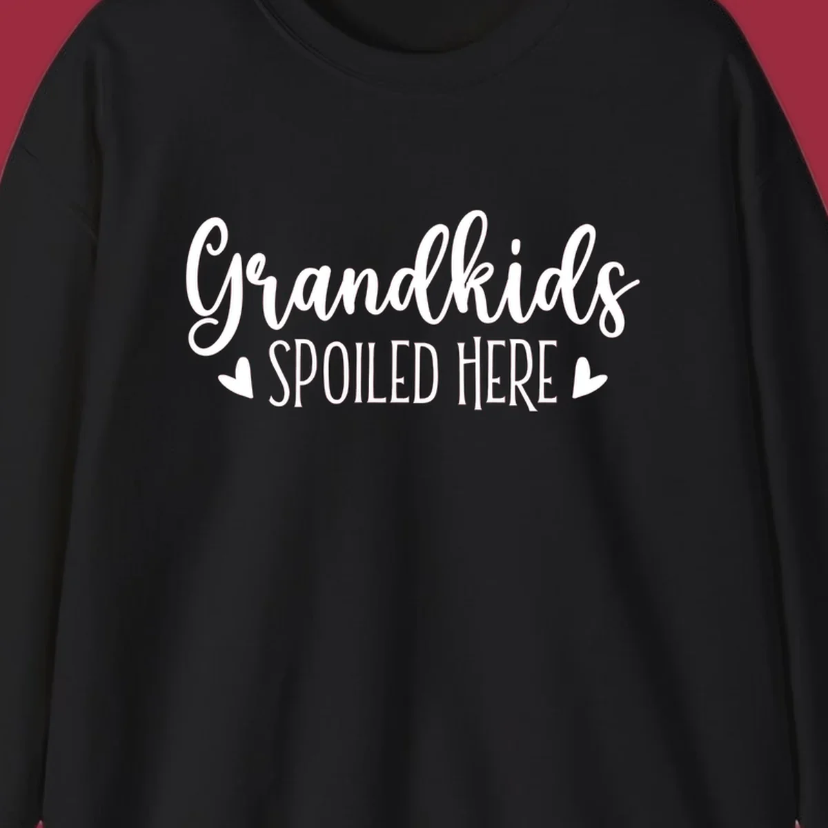 Grandkids Spoiled Here typography design with heart accents.