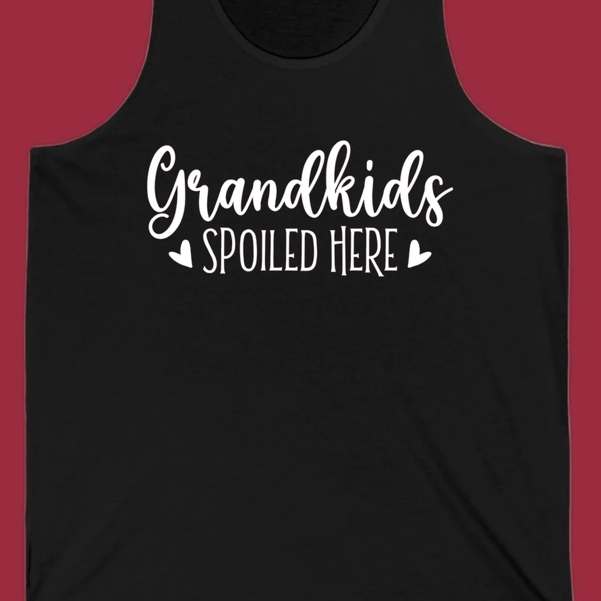 Grandkids Spoiled Here typography design with heart accents.