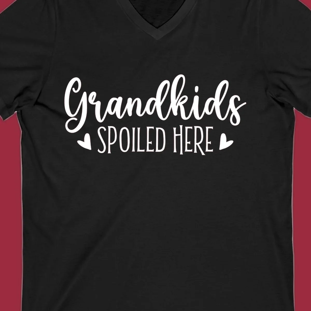 Grandkids Spoiled Here typography design with heart accents.