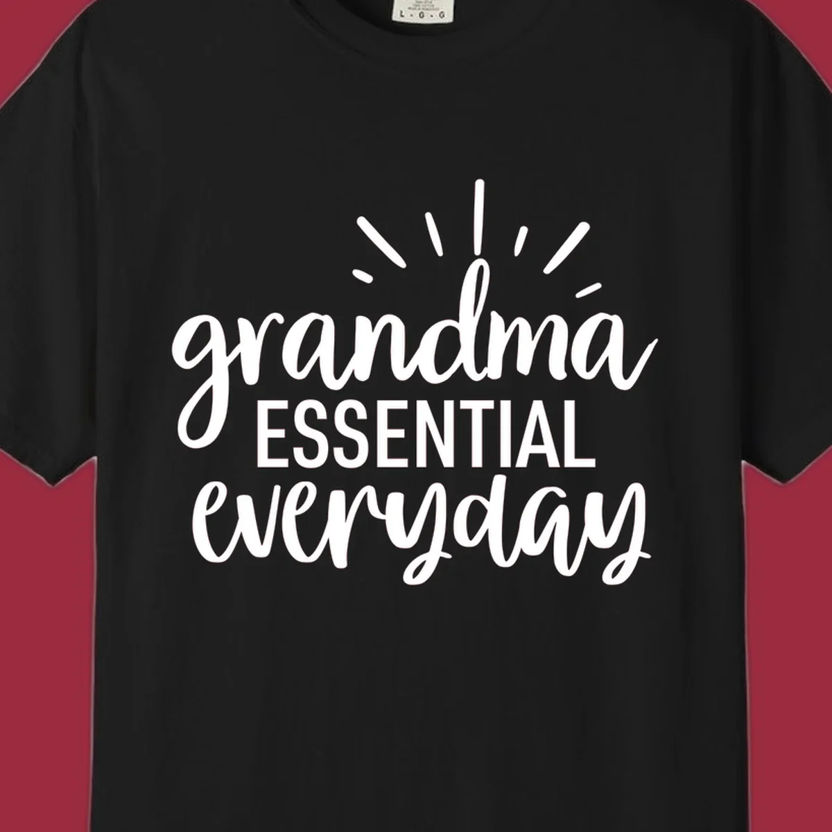 Grandma Essential Everyday text design with sun rays.