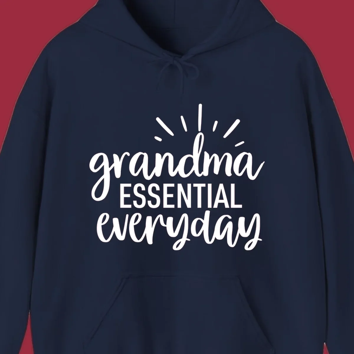 Grandma Essential Everyday text design with sun rays.