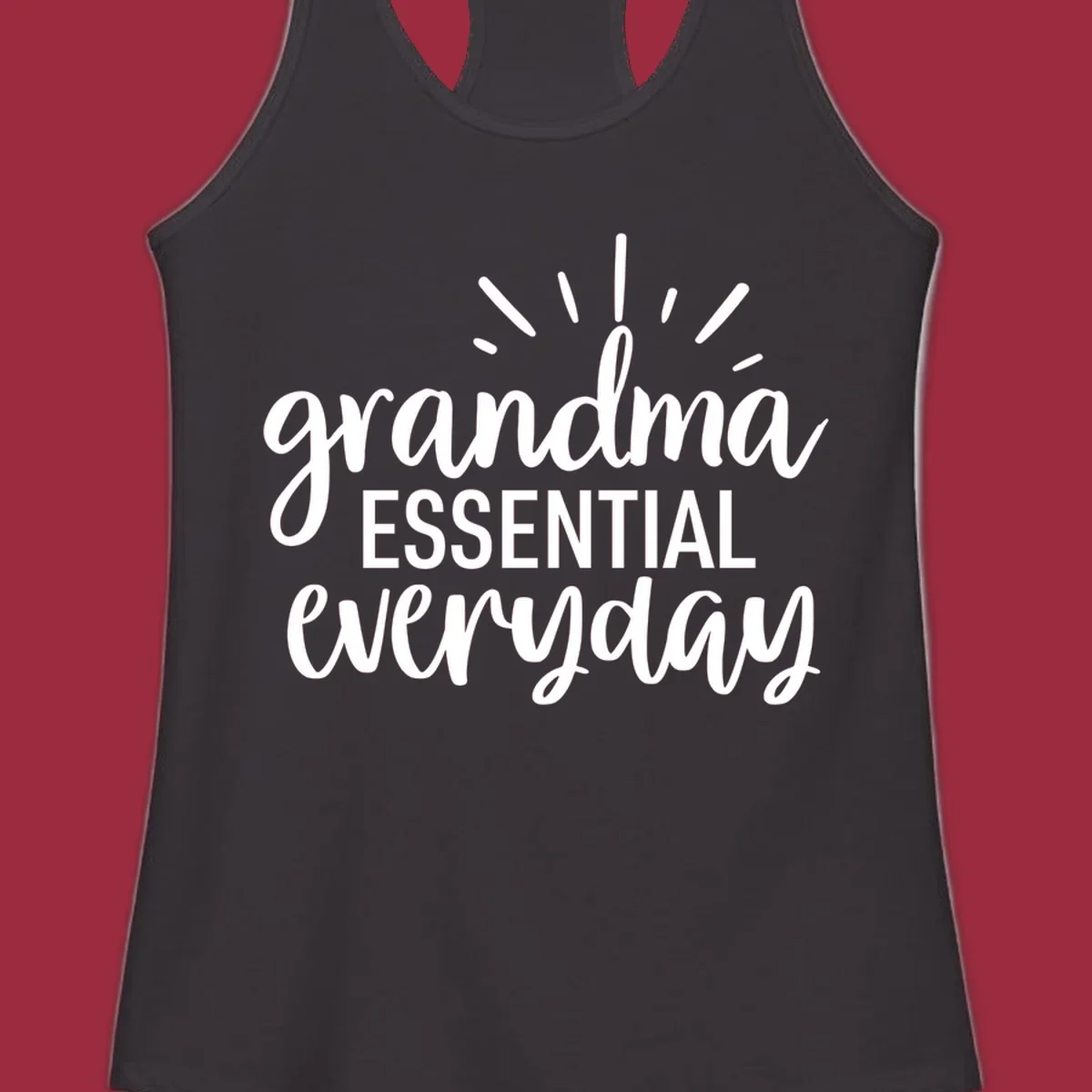 Grandma Essential Everyday text design with sun rays.