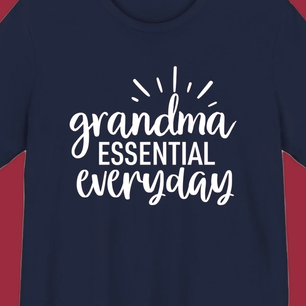 Grandma Essential Everyday text design with sun rays.