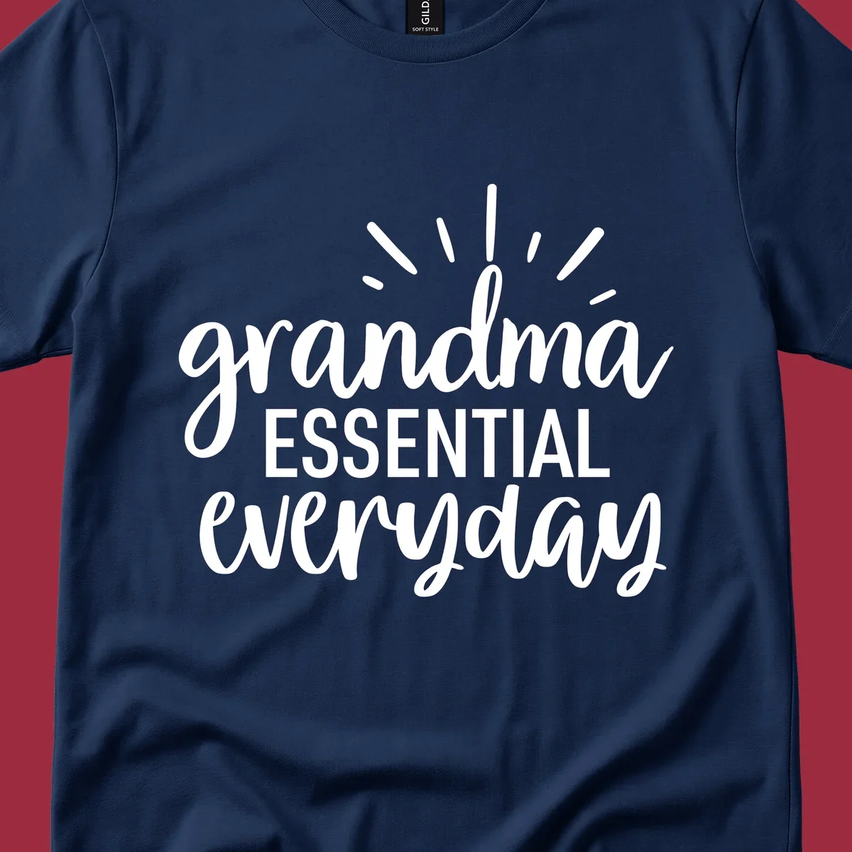 Grandma Essential Everyday text design with sun rays.