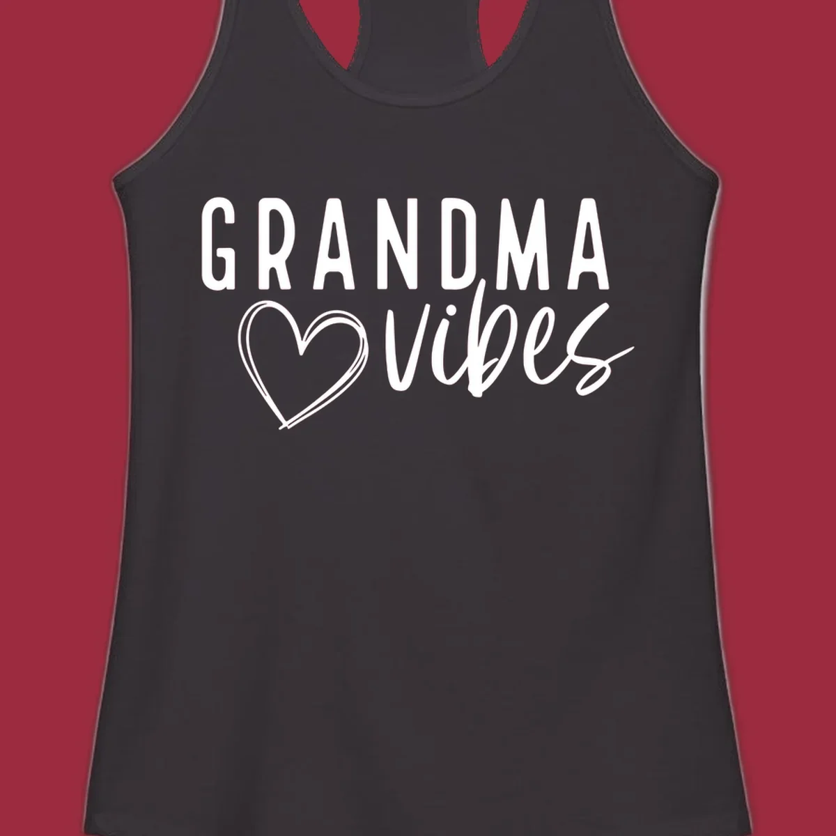 Grandma vibes text with a heart outline, white on black and black on white.