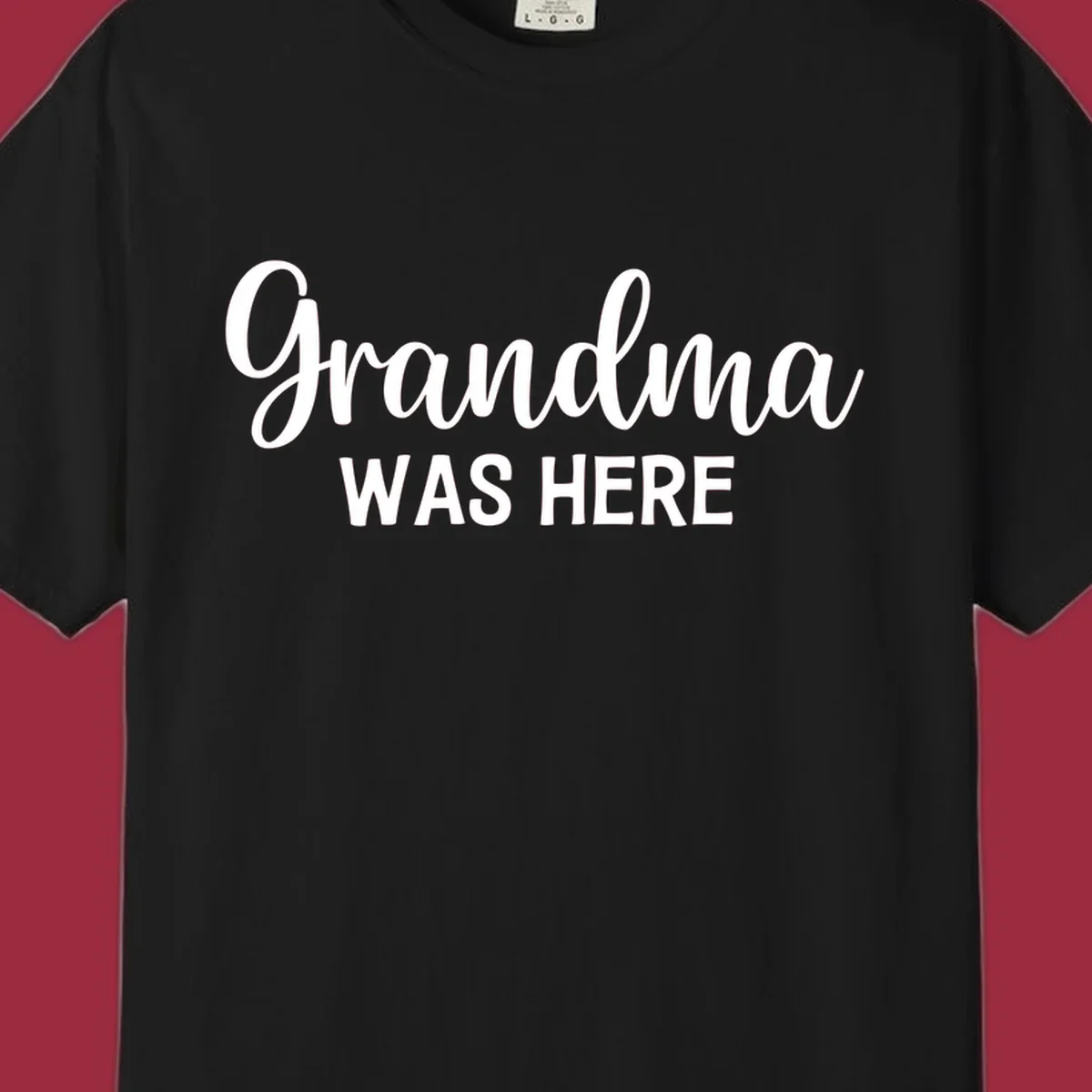 Grandma Was Here typography design with script and block text.