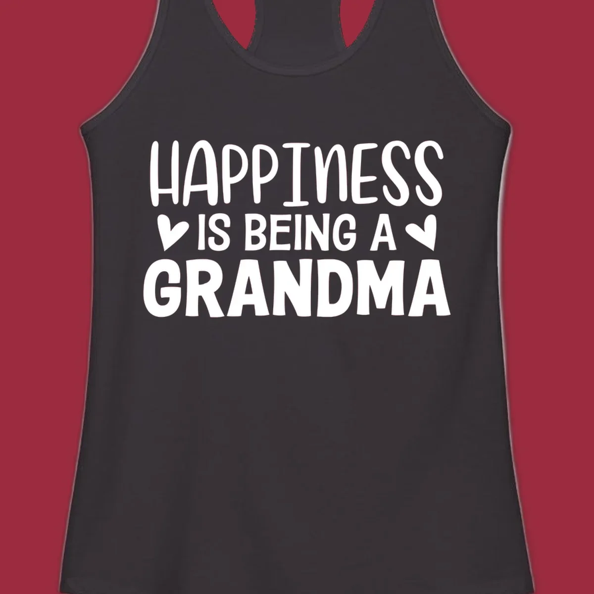 Happiness is being a grandma quote with hearts graphic.