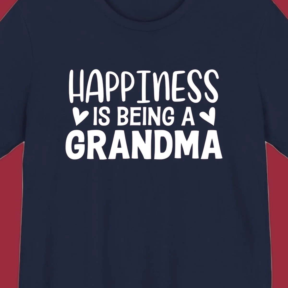Happiness is being a grandma quote with hearts graphic.
