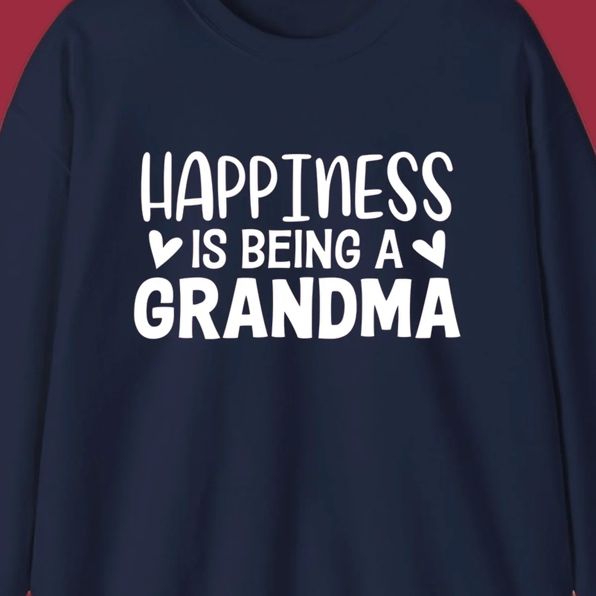 Happiness is being a grandma quote with hearts graphic.