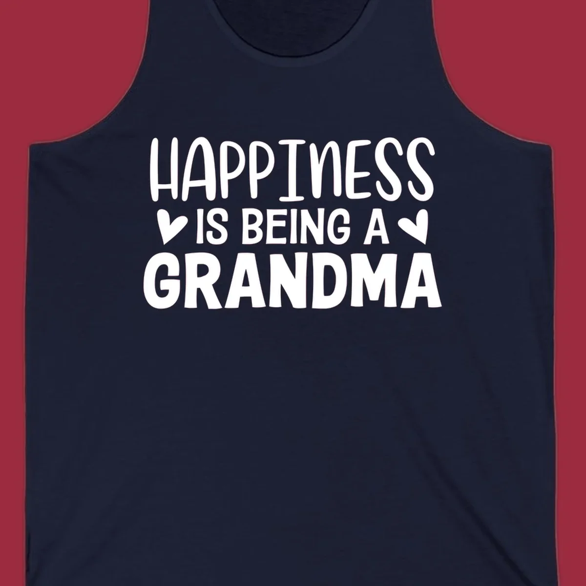 Happiness is being a grandma quote with hearts graphic.