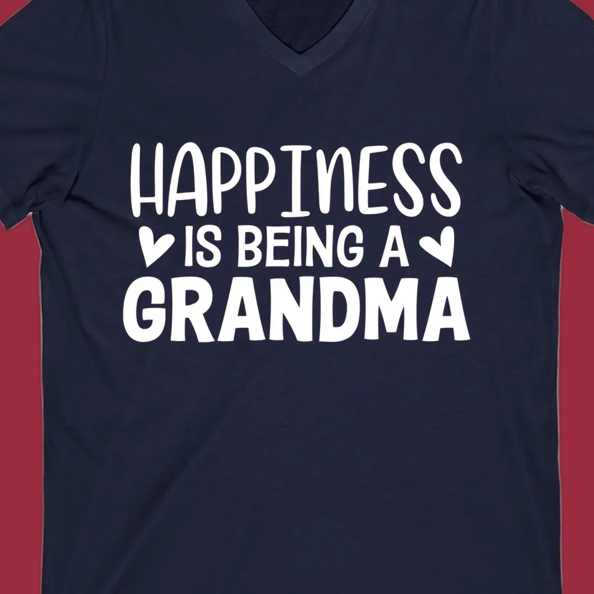 Happiness is being a grandma quote with hearts graphic.