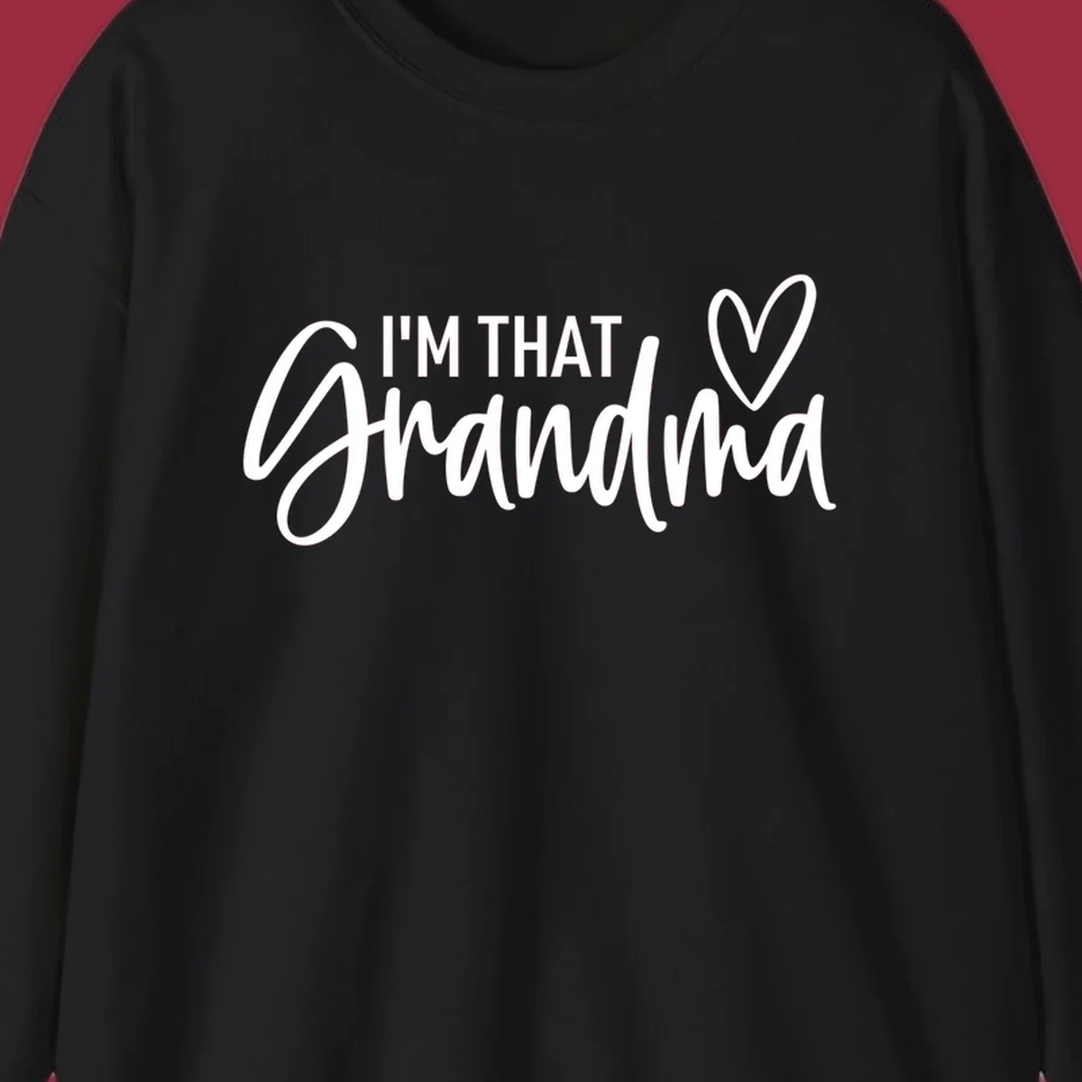 I'm That Grandma text with a heart, in white and black.