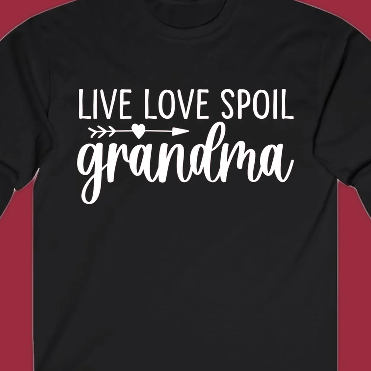 Live Love Spoil Grandma typography design with heart and arrow.