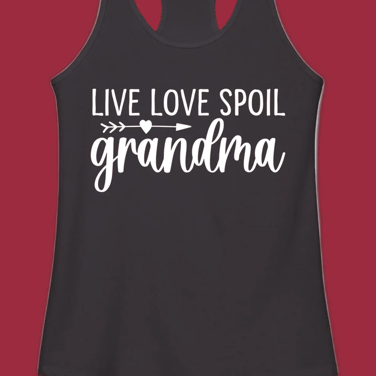 Live Love Spoil Grandma typography design with heart and arrow.